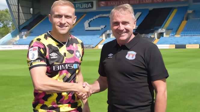 官方 : 卡莱尔联免签苏格兰中场麦克古奇